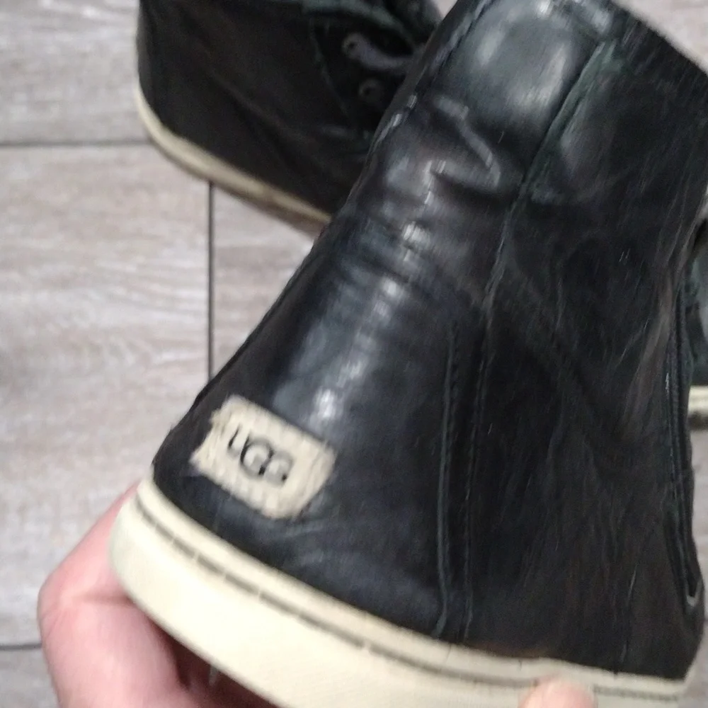 UGG womens black leather zip or lace high top sneakers. Size 8